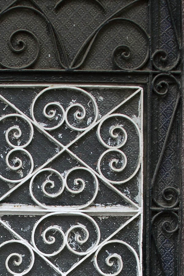 Photo 02696: Black metal door with decorated lattice