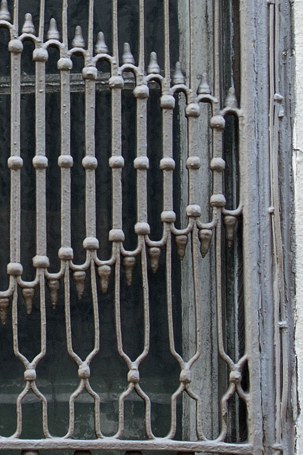Photo 03106: Grey window with two frames and heavily decorated latticework