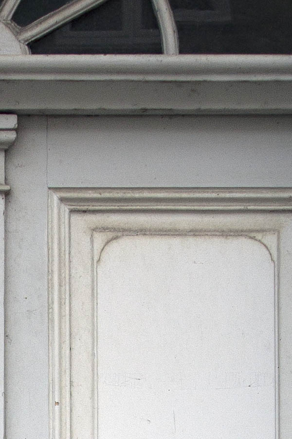 Photo 03876: Worn, panelled double door in white and grey with top window