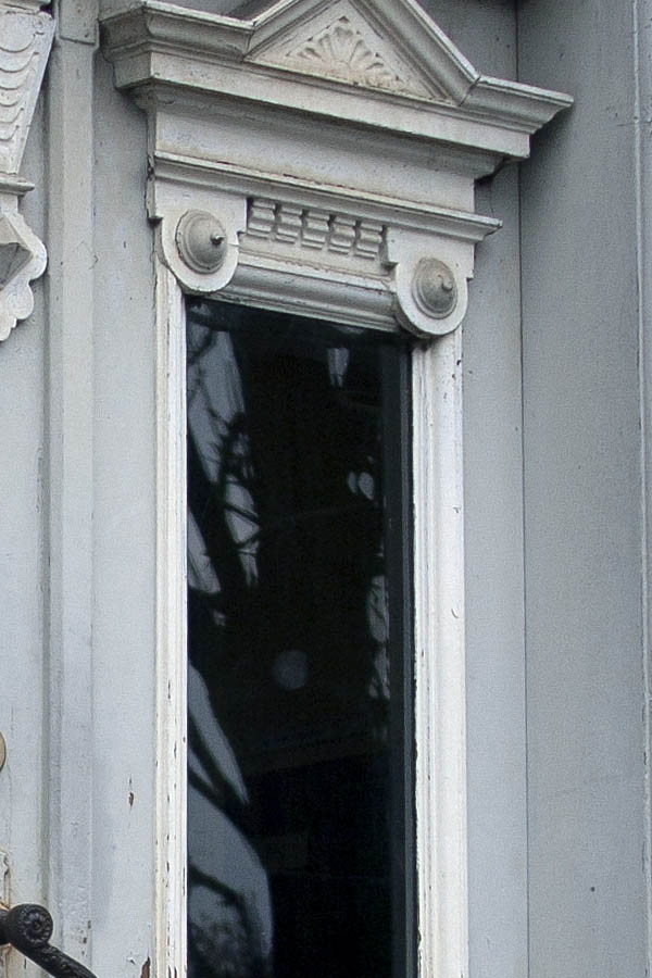 Photo 03997: Worn, panelled double door in white and grey with top window