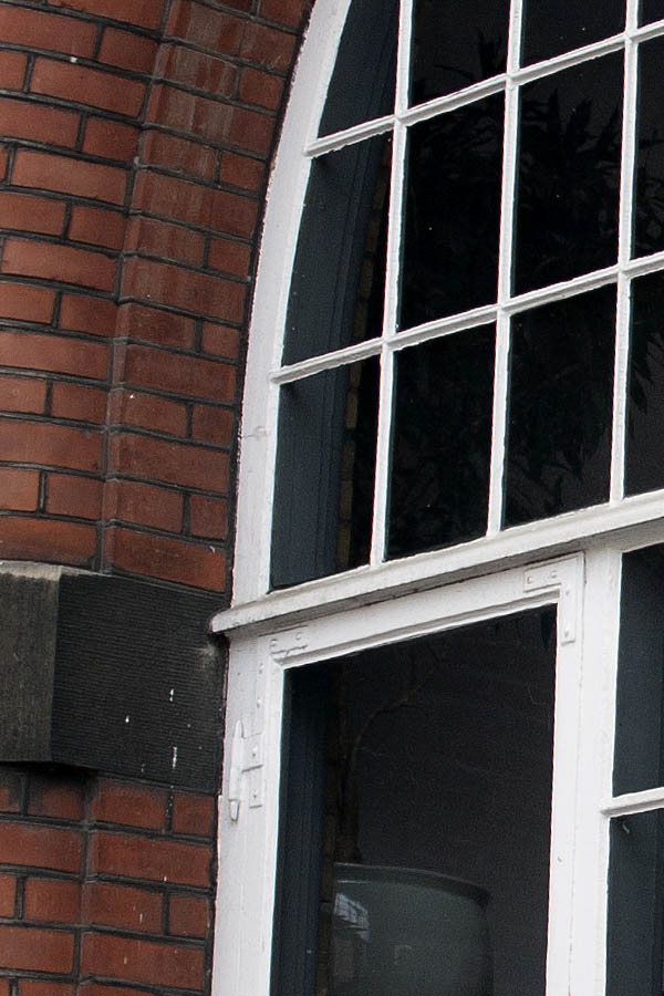 Photo 04018: Large, formed, white window with 114 panes