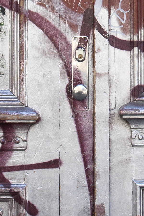 Photo 04113: Panelled, carved, red double door