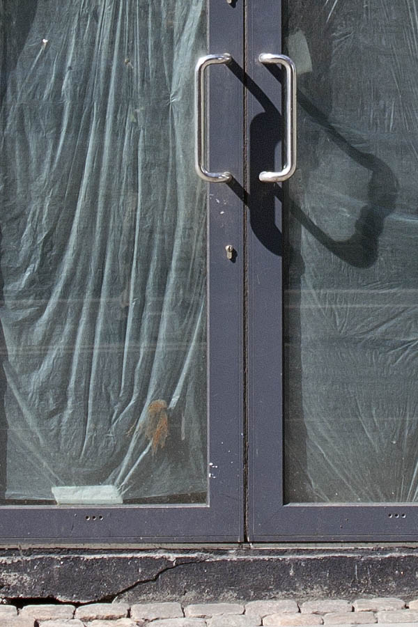 Photo 04128: Grey aluminium double door and windows in a closed shop facade