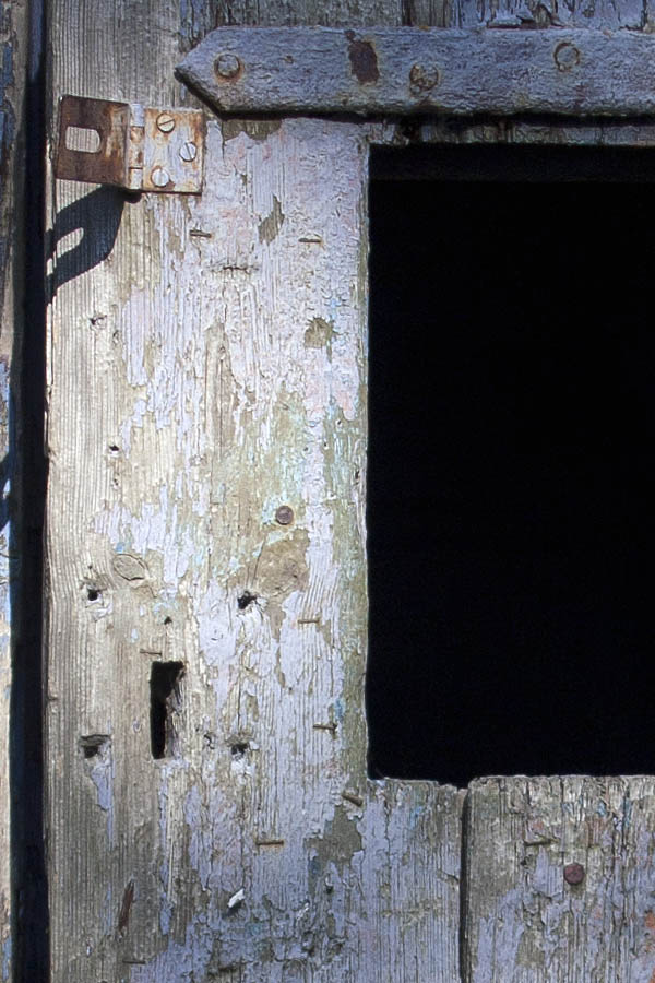 Photo 04194: Decayed, violet door leading to a shed