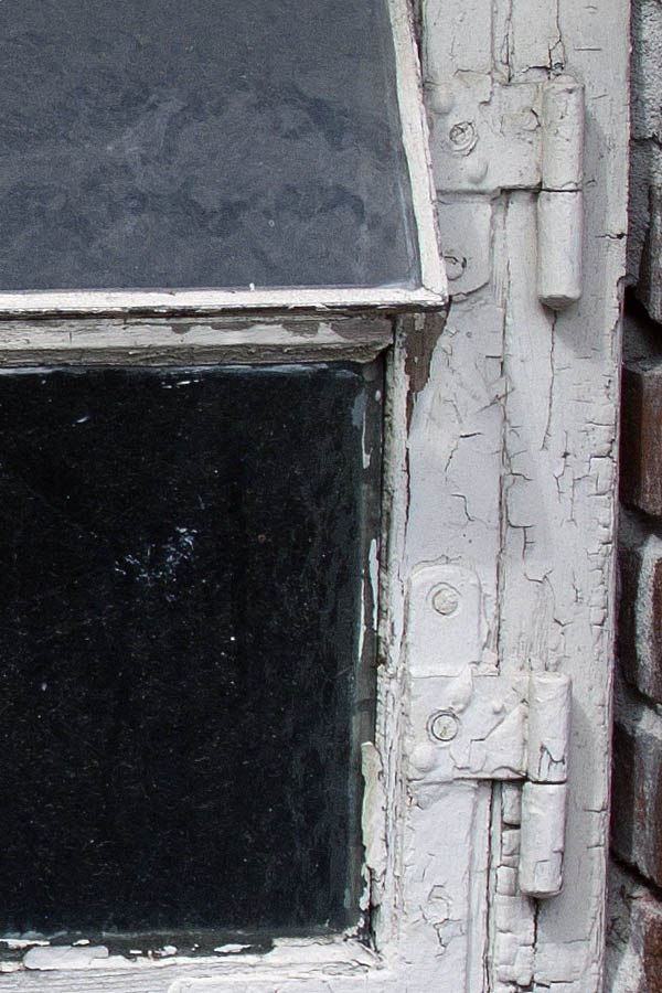 Photo 04395: Decayed, white cellar window with two frames and three panes