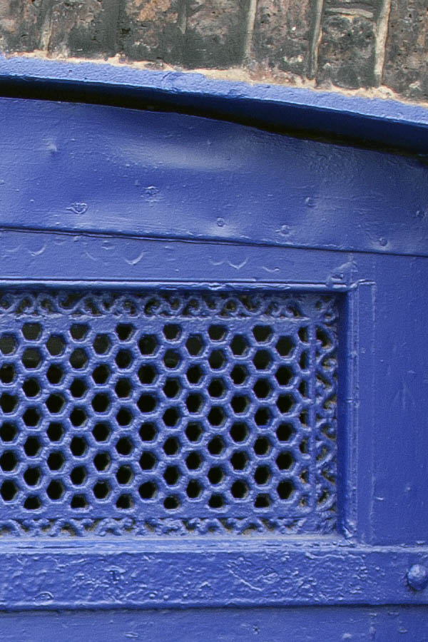 Photo 04441: Formed, blue gate leading to a cellar