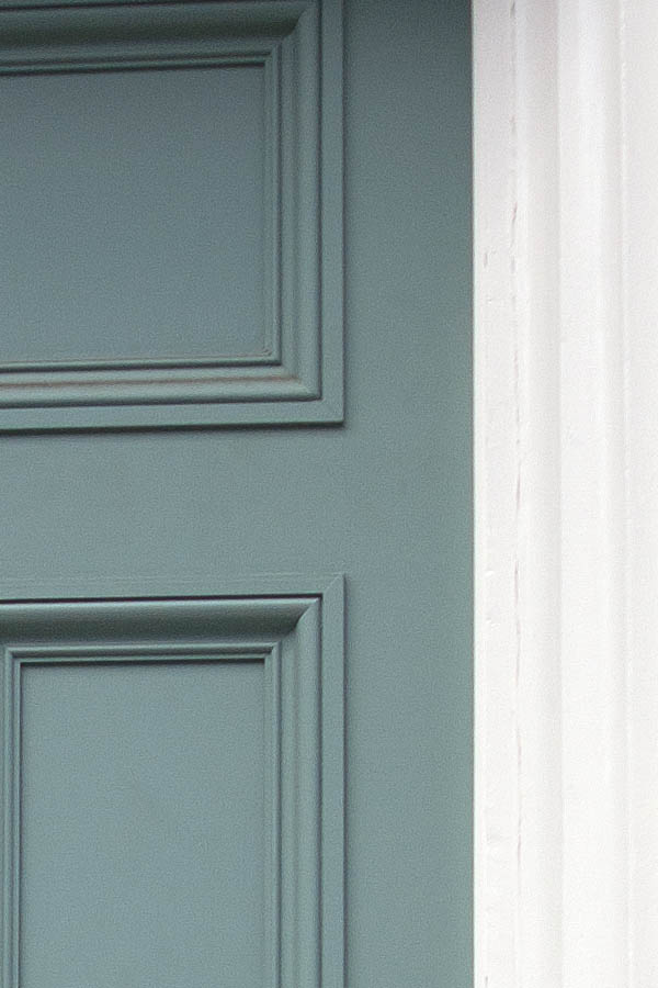 Photo 04608: Panelled, teal door with decorated fan light