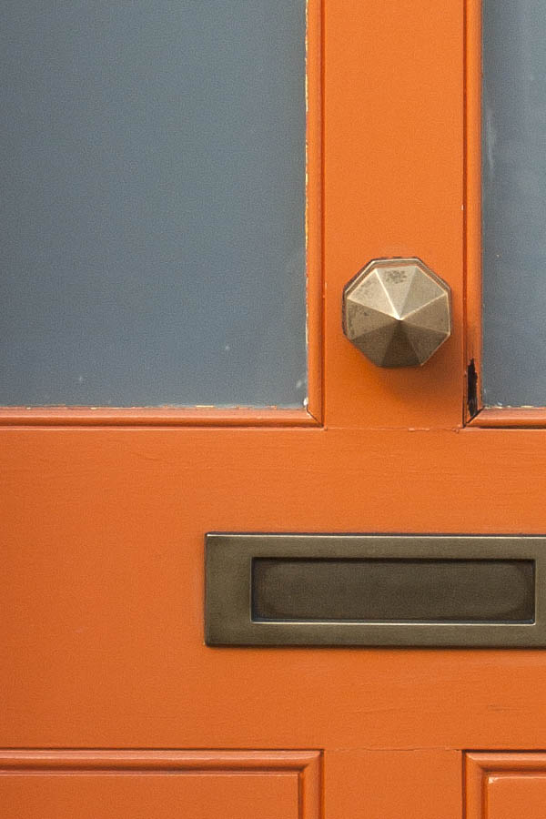 Photo 05244: Panelled, orange door with fan light