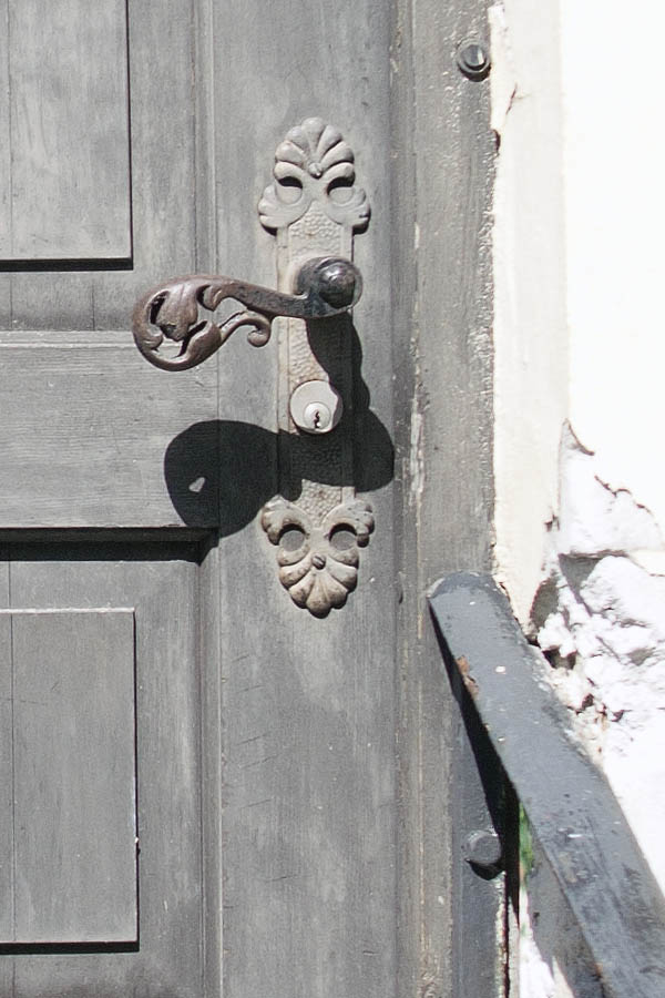 Photo 06051: Panelled, grey door with banisters