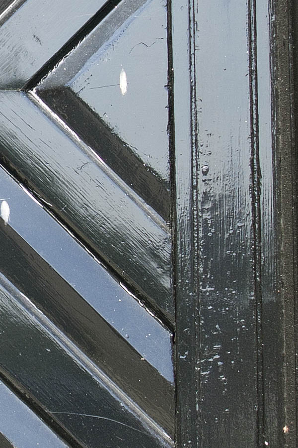 Photo 06056: Panelled, black door with diamond-shaped pattern