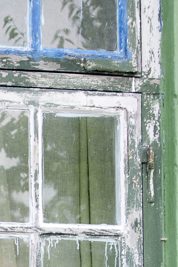 Photo 06252: Worn, green window with four frames and 16 panes