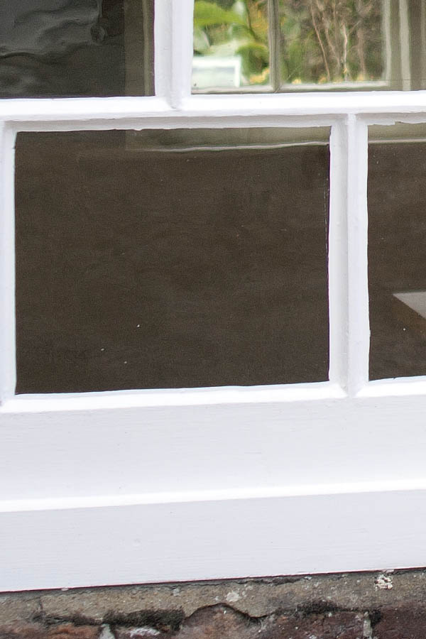 Photo 06501: White sliding window with three frames and 30 panes