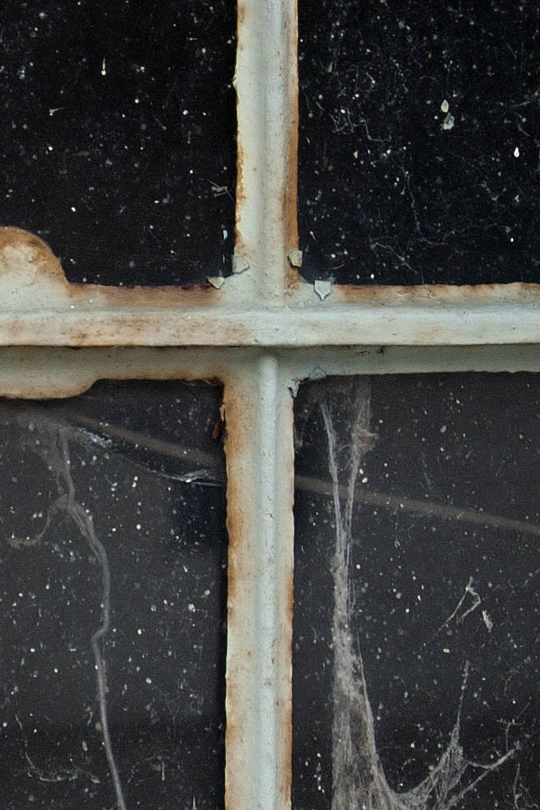 Photo 06931: Formed, grey metal stable window
