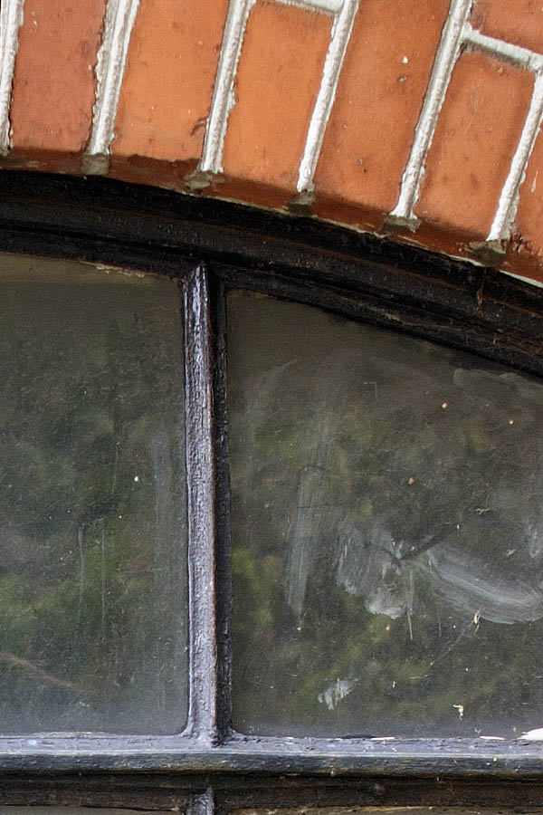 Photo 07148: Formed, black metal window in stable style