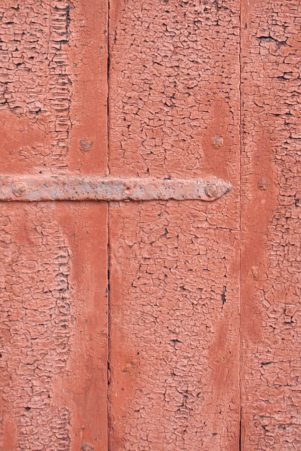 Photo 07246: Worn, red half-door made of planks