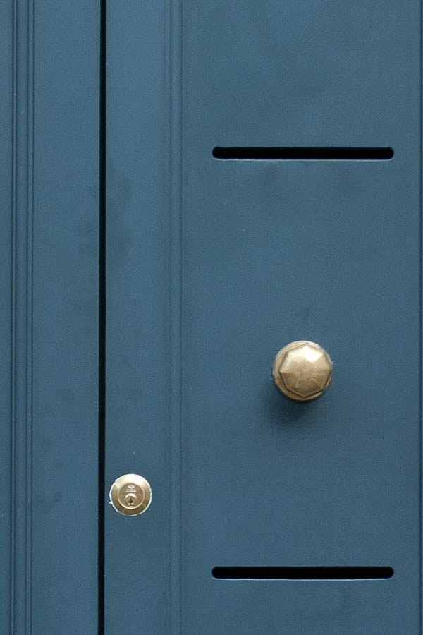 Photo 07903: Panelled, teal double door with latticed top window