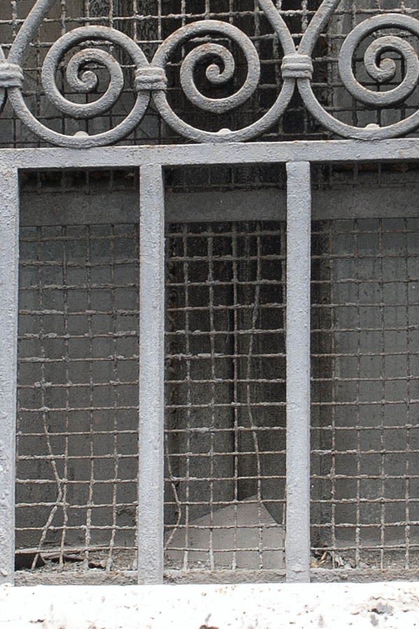 Photo 07971: Latticed, grey window with wire net