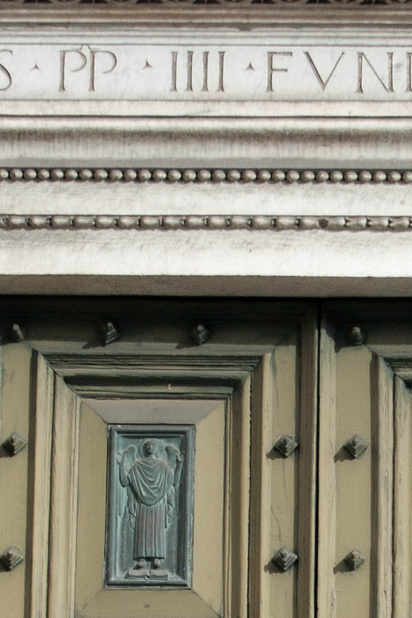 Photo 08047: Large, panelled, brown metal double door with pilaster