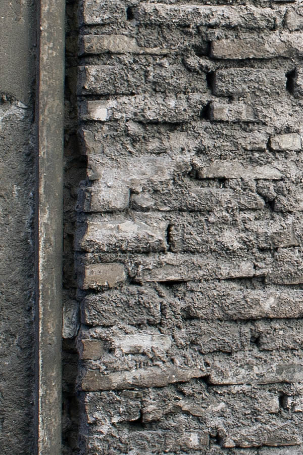 Photo 08086: No door. Former door covered with grey brickwork.