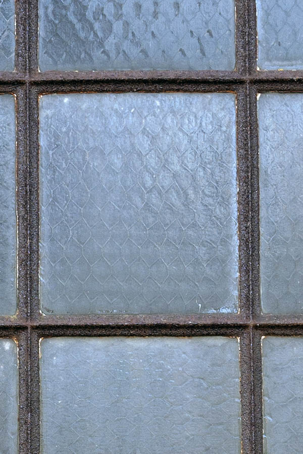 Photo 08224: Rusty, brown metal window with 16 panes