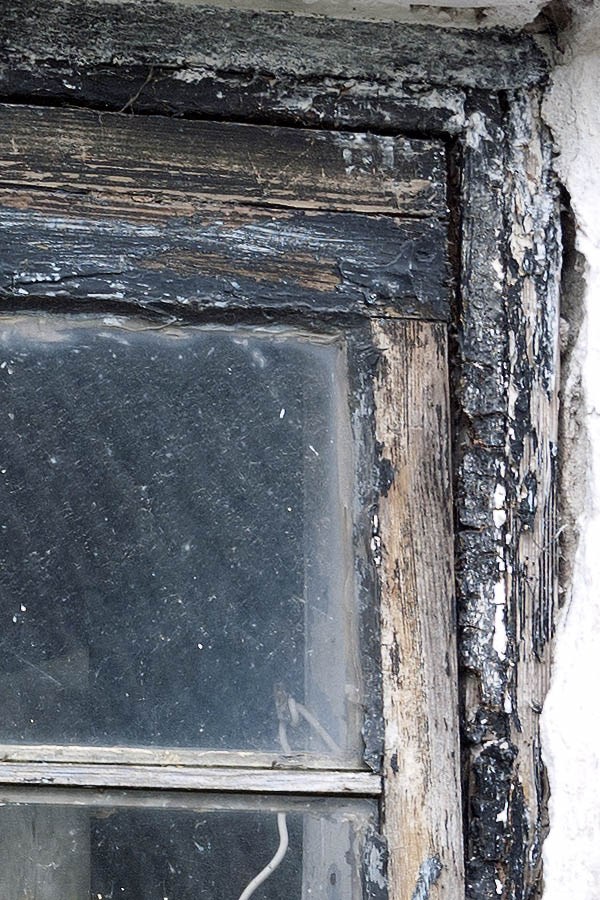 Photo 08354: Decayed, black stable window