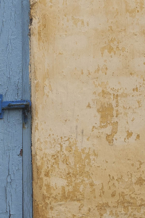 Photo 08471: Worn, light blue door made of planks