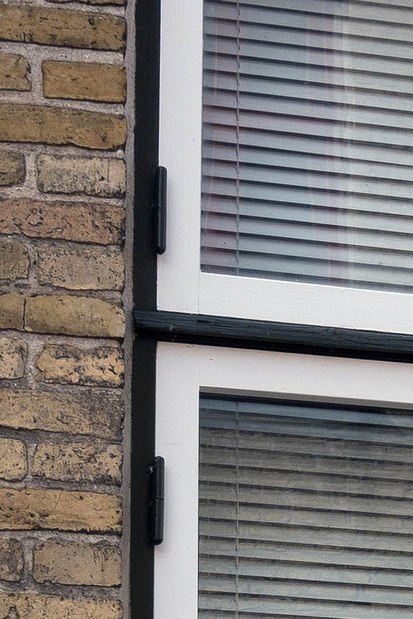 Photo 08524: Black and white window in Dannebrog style. White panes and black frame.