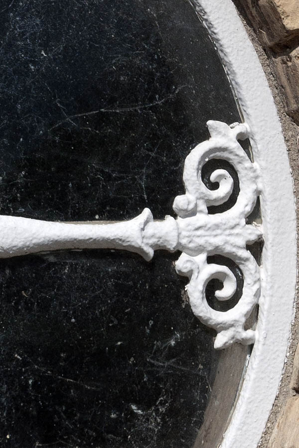 Photo 08945: Round, white, cast iron window