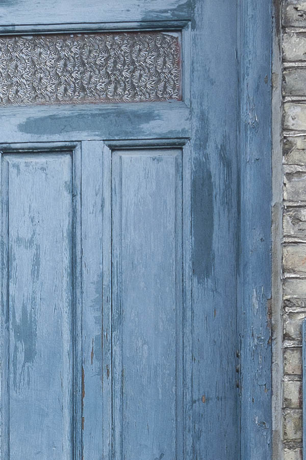Photo 09011: Panelled, teal door with door light and top window