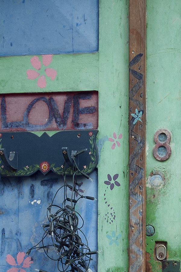 Photo 09072: Worn, colourful, green, blue and red double door