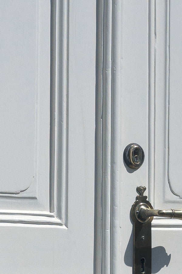 Photo 09187: Carved, panelled, white double door