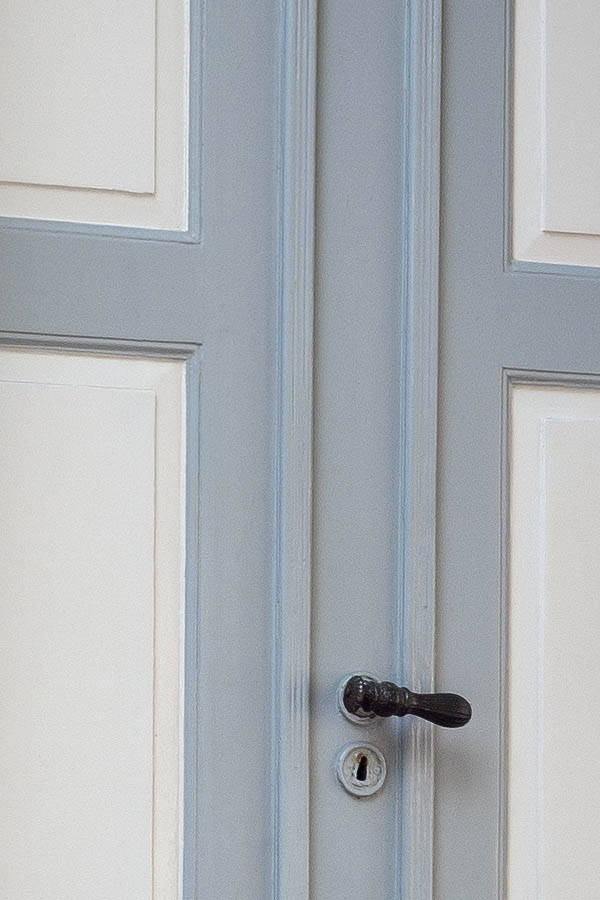 Photo 09189: Panelled, white and grey double door with top window