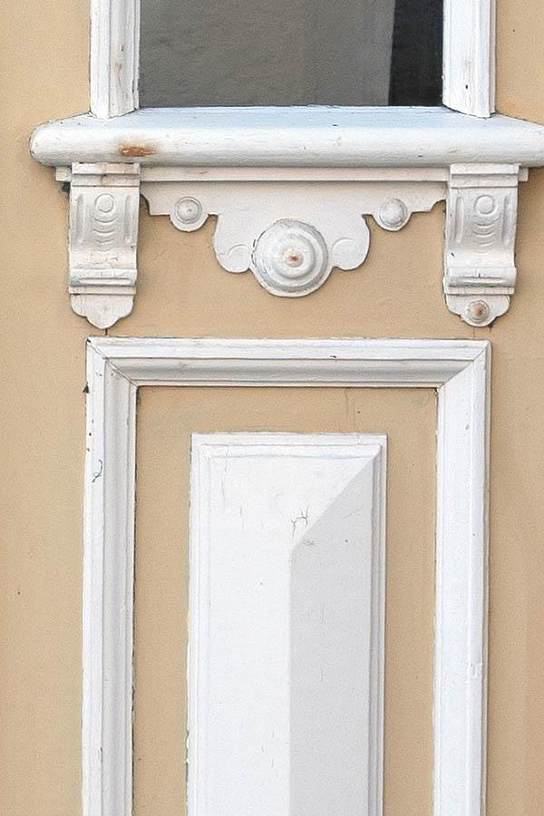 Photo 09338: Carved, panelled, light yellow and white door with fan light and door lights