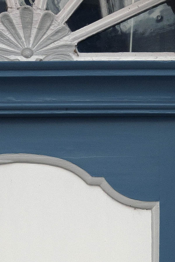 Photo 09386: Carved, panelled, blue, grey, and white door with fan light