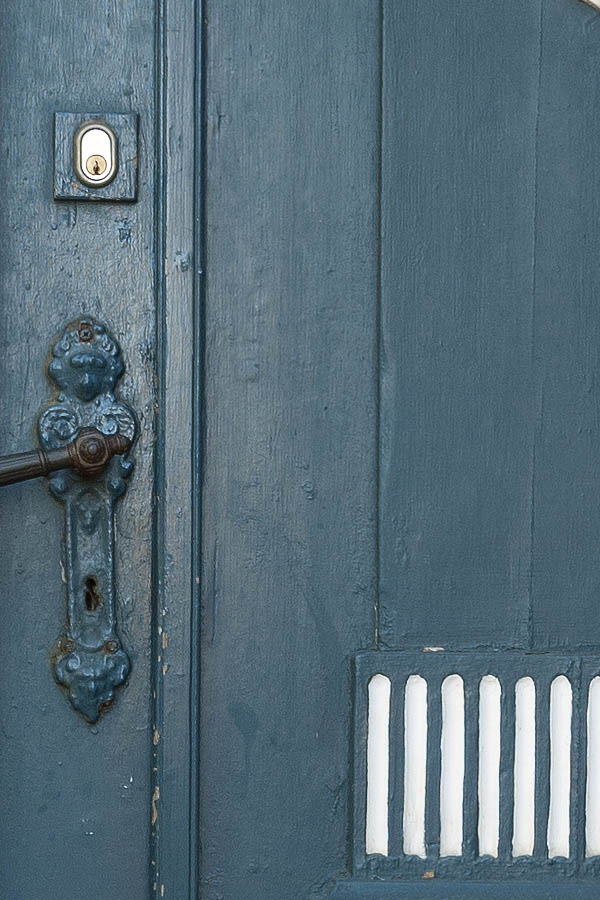 Photo 09486: Carved, panelled, teal and white double door with small door lights