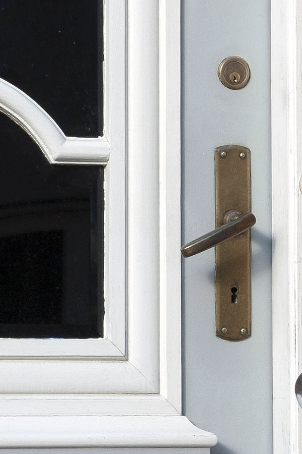 Photo 09499: Carved, panelled, grey and white door with door light