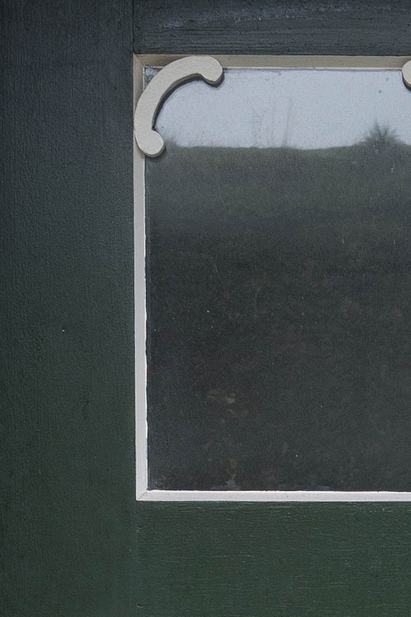 Photo 09702: Panelled, green and white door with door lights