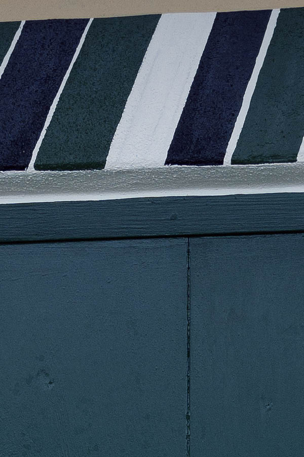 Photo 09758: Green and white trapdoor made of planks with a diamond-shaped door light