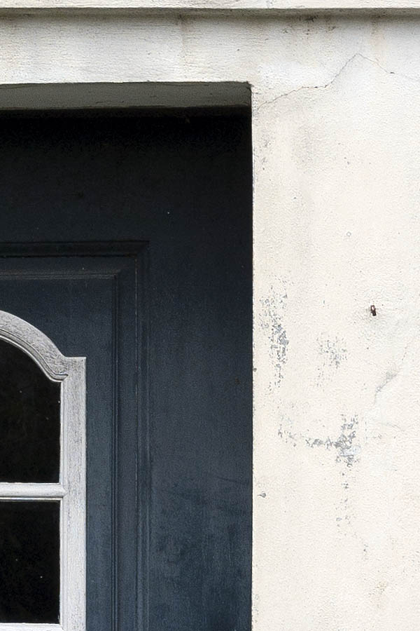Photo 09782: Panelled, blue and white door with formed door light