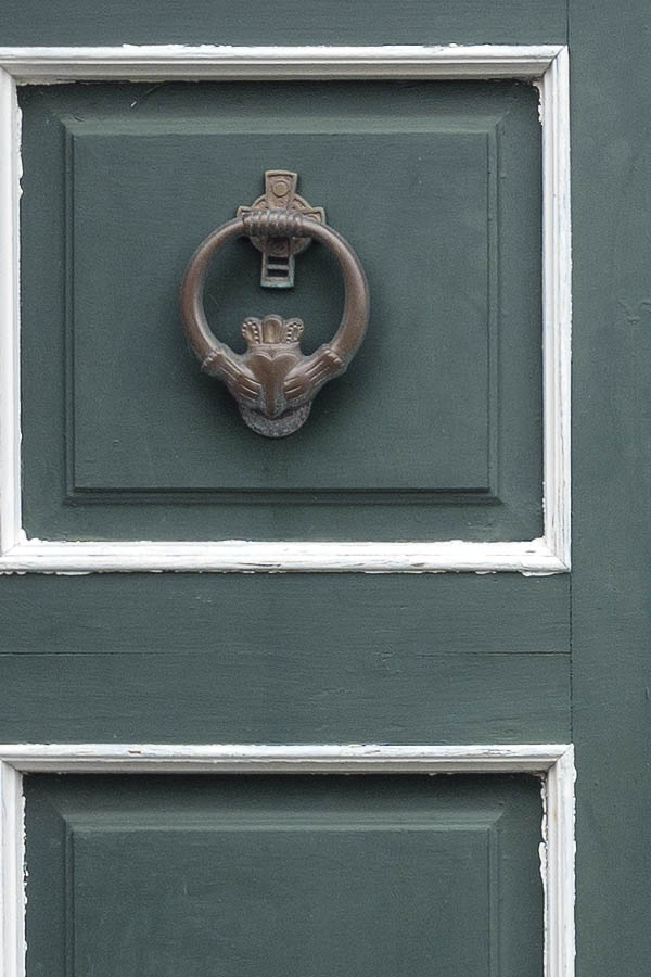 Photo 09868: Worn, panelled, green and white double door with door lights