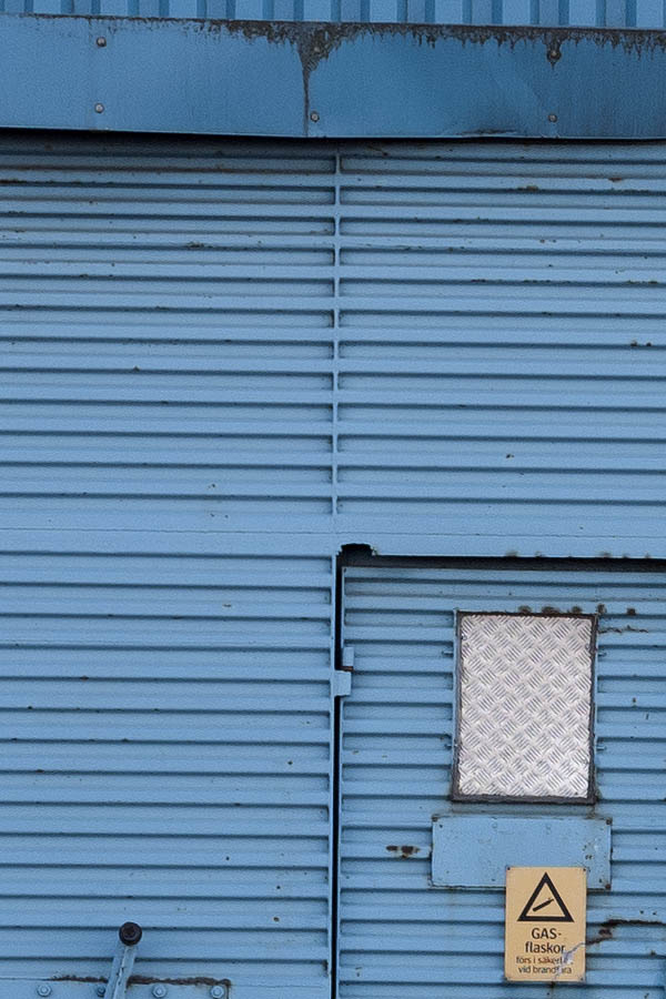 Photo 09999: Blue sliding gate with minor door
