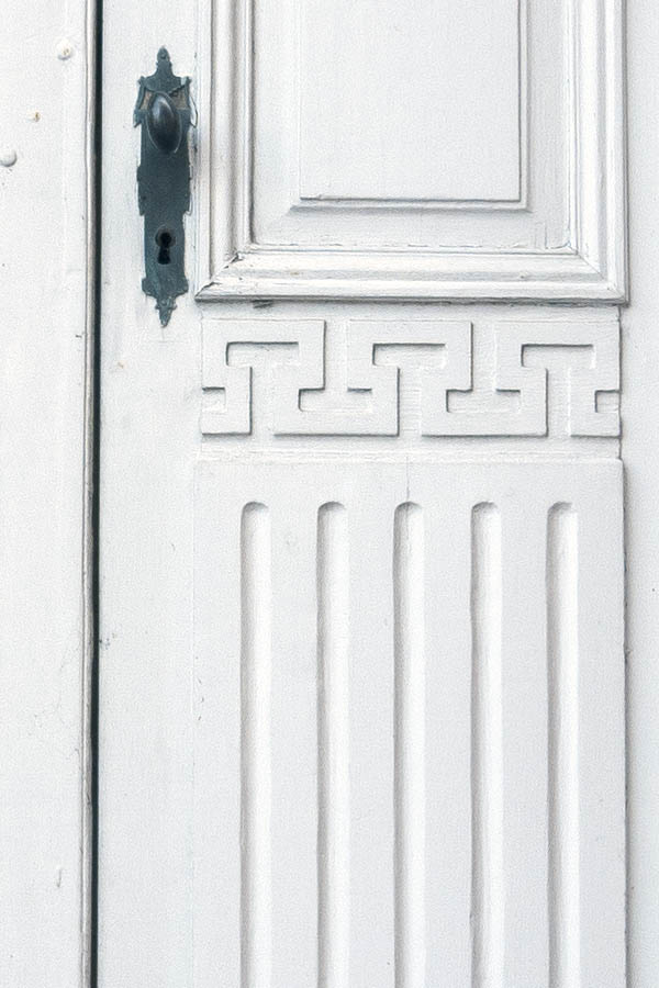 Photo 10047: Carved, panelled, white double door with fan light