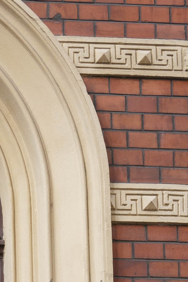 Photo 10072: Formed, dark brown window with four frames