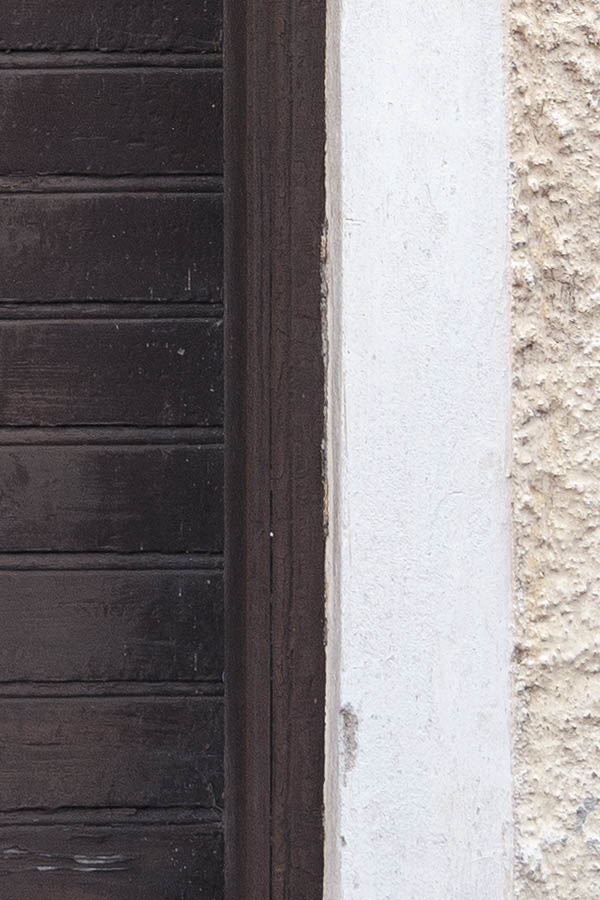 Photo 10204: Brown door made of planks with top window