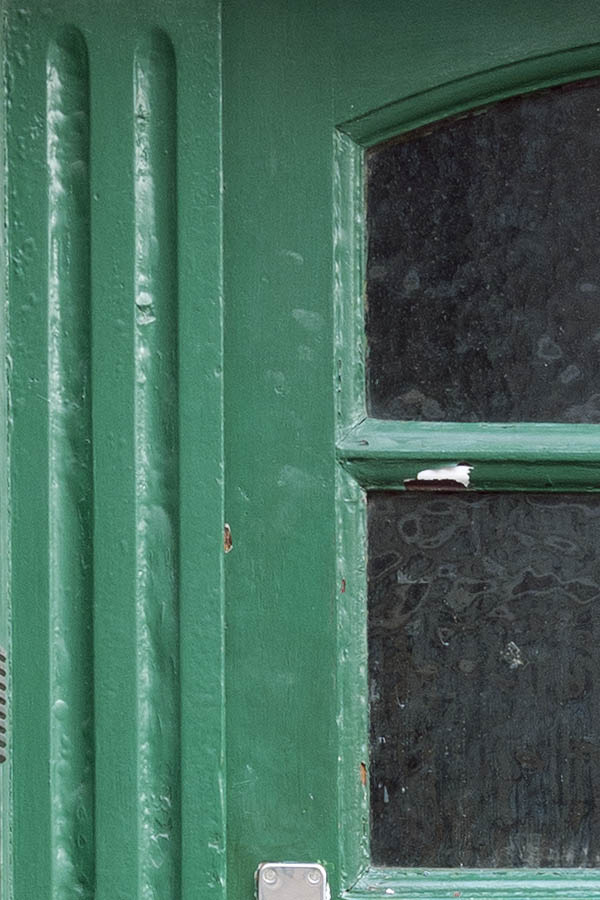 Photo 10544: Panelled, green door with door lights