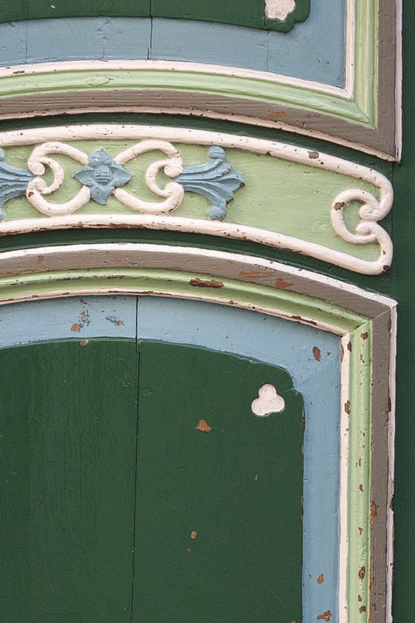 Photo 10813: Carved, panelled, green, blue, light green and white door