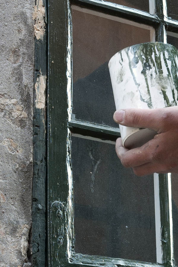 Photo 10868: Repair. Painting a green window.