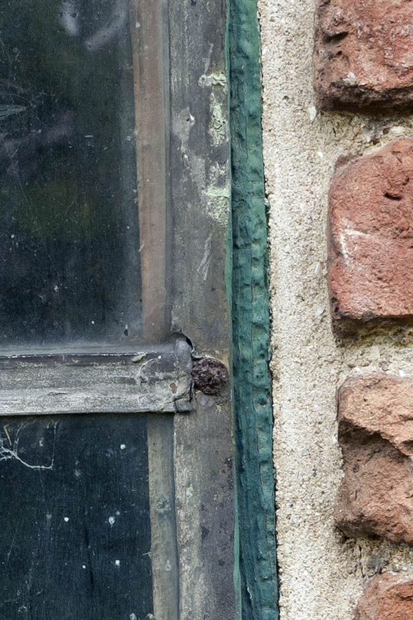 Photo 11116: Lopsided, little, green window with four panes