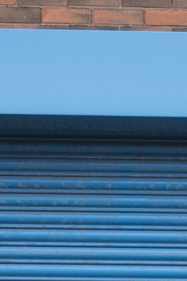 Photo 11462: Light blue security shutter gate