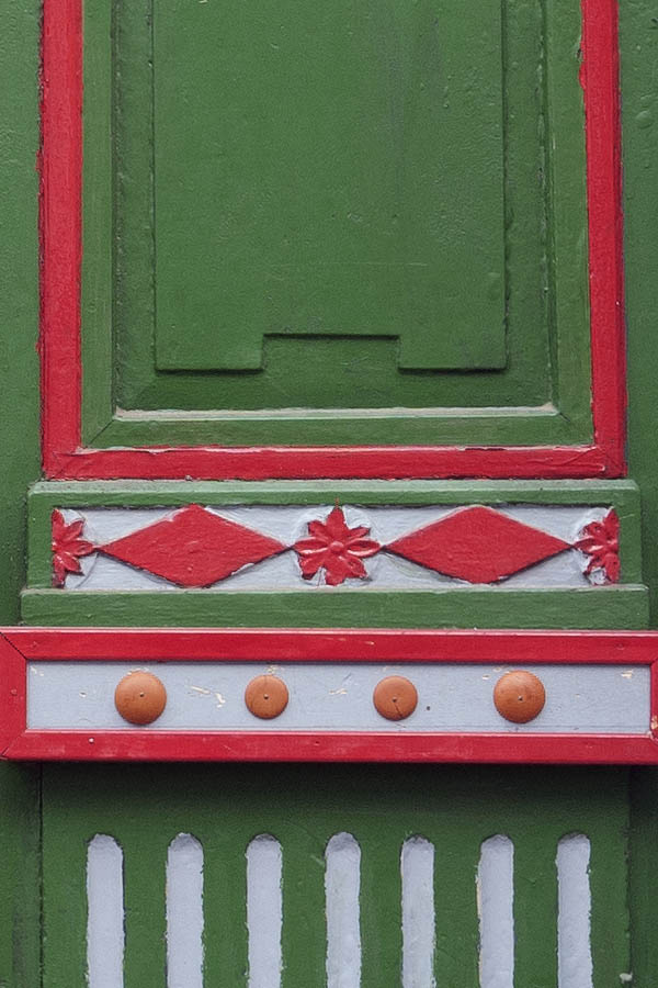 Photo 11877: Panelled, carved, green, red and light grey double door with top window